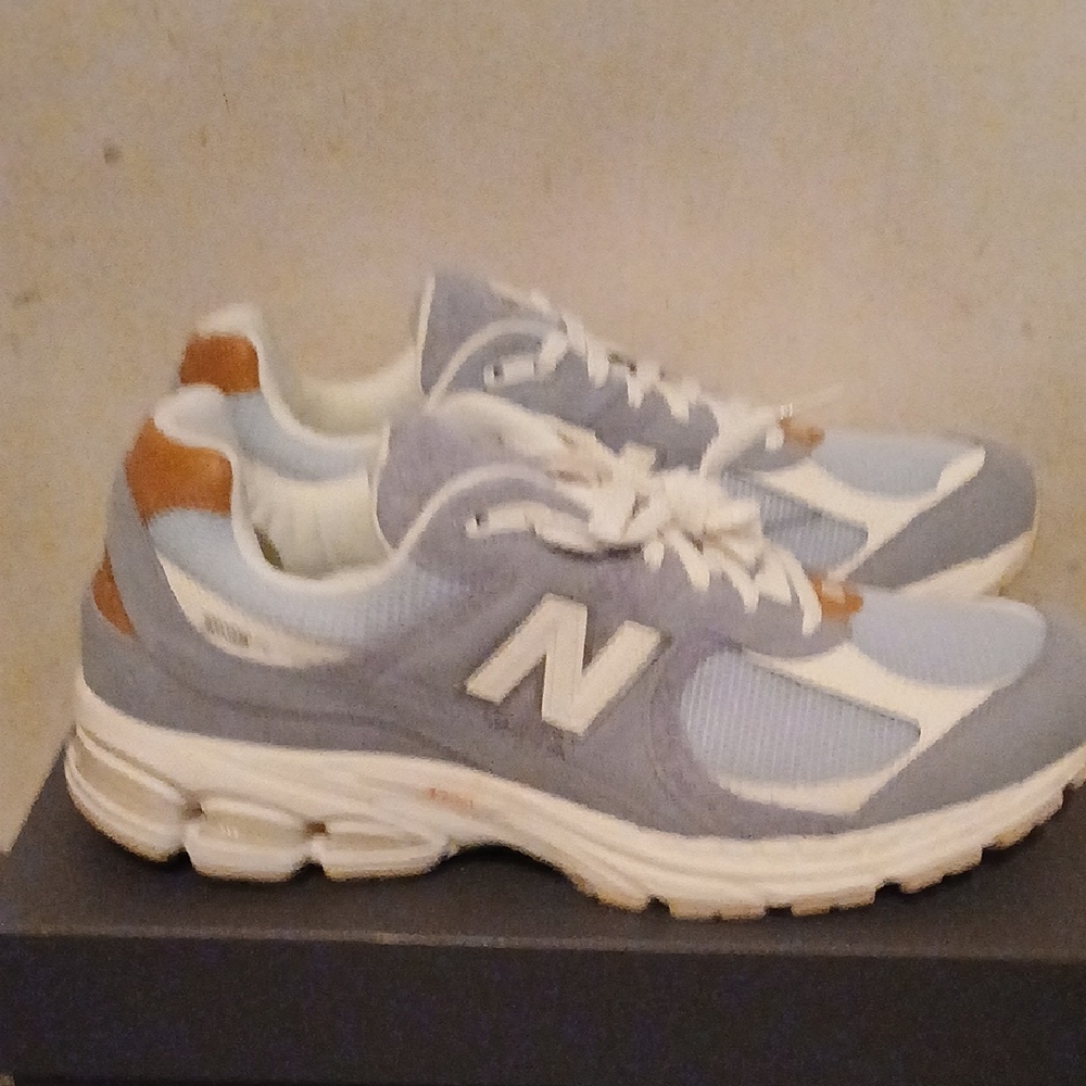 New Balance Light Blue and White Running Shoes